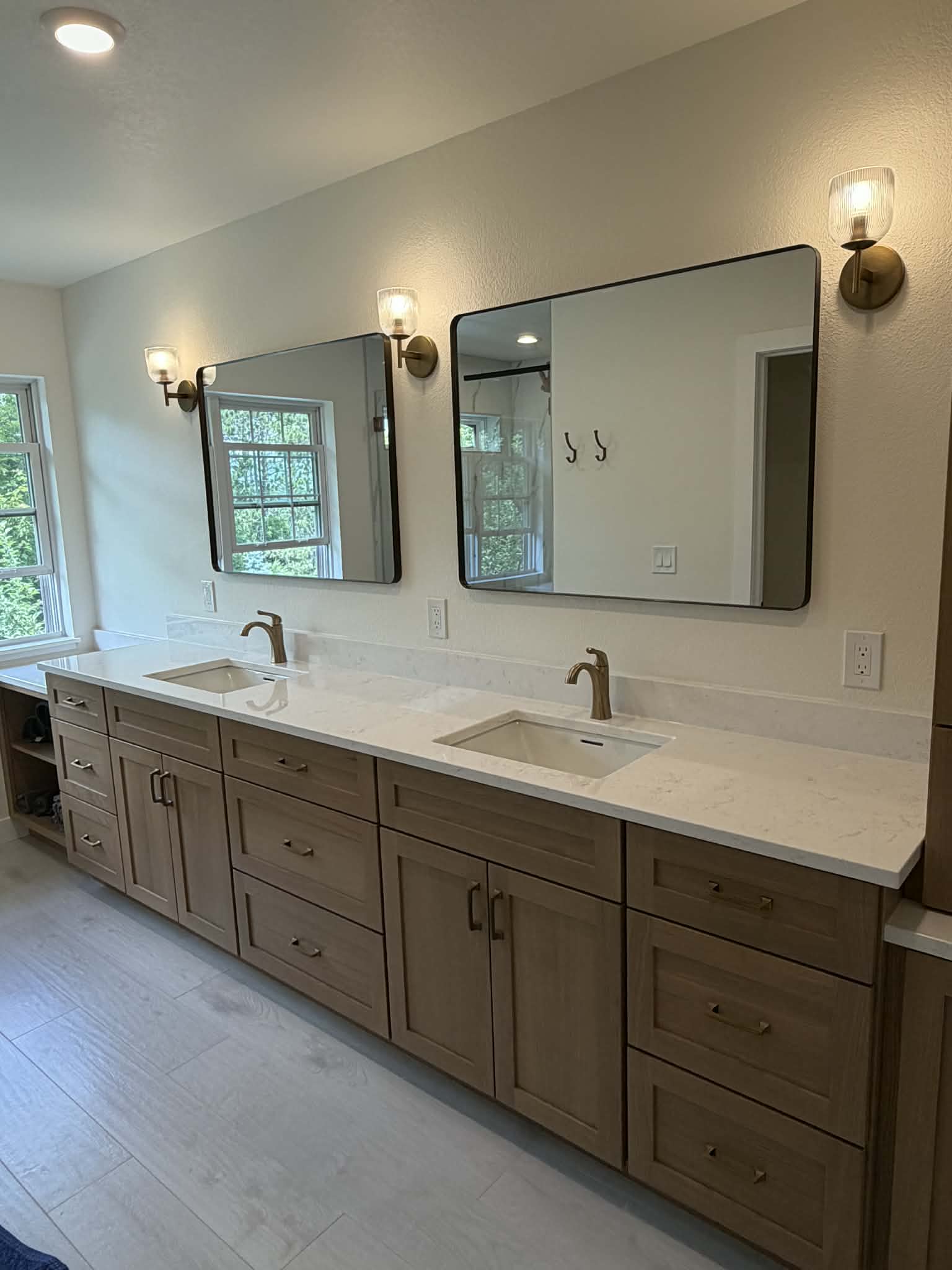 Custom double-sink bathroom vanity with quartz countertop